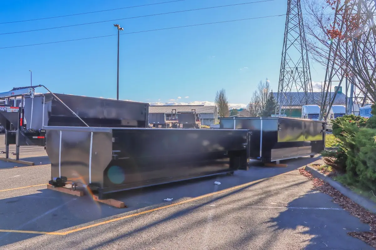 Roll-off dumpster ready for waste disposal at job site for 2 Yard Dumpster Rental in Lynnwood